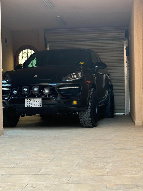 Porsche Cayenne 958 GTS with Akioverland Custom Mesh Wheels Parked in a Garage