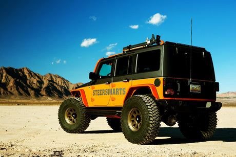 bucks off-road wheel f607 bronze on orange jeep wrangler