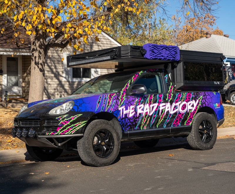 The rad factory Cayenne 955 offroad RV with akioverland lift kit at the Porsche