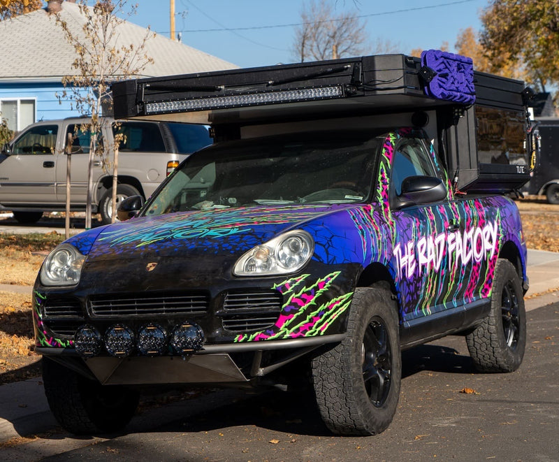 The rad factory Cayenne 955 offroad RV with akioverland lift kit at the Porsche