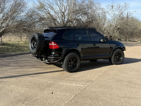 Blackout Porsche Cayenne 957 gts offroad Tubular bumper with swing out tire carrier. 